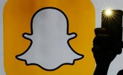 企业出海 - Snapchat在媒体版块插 播广 告 强制用户观看